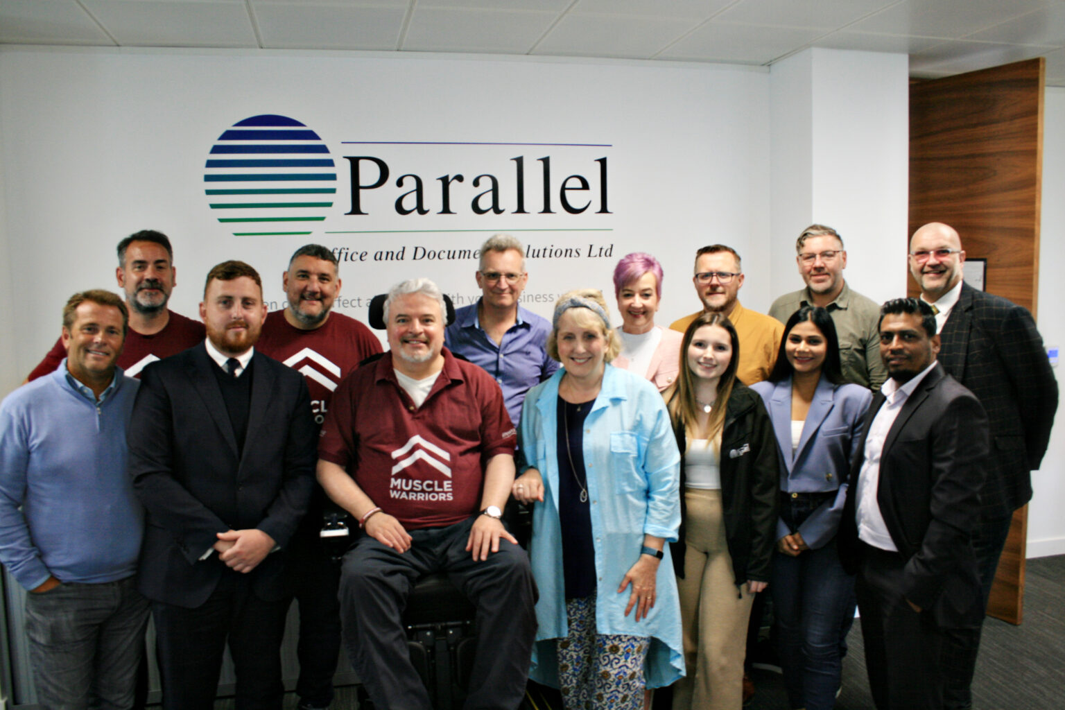 MD Gavin J. Auckland with some of the team with Muscles for Help CEO Michael McGrath MBE DL giving the Muscle Warrior 💪❤️ salute, a visible symbol of hope, courage, strength and unit for all those with muscular dystrophy across the UK.